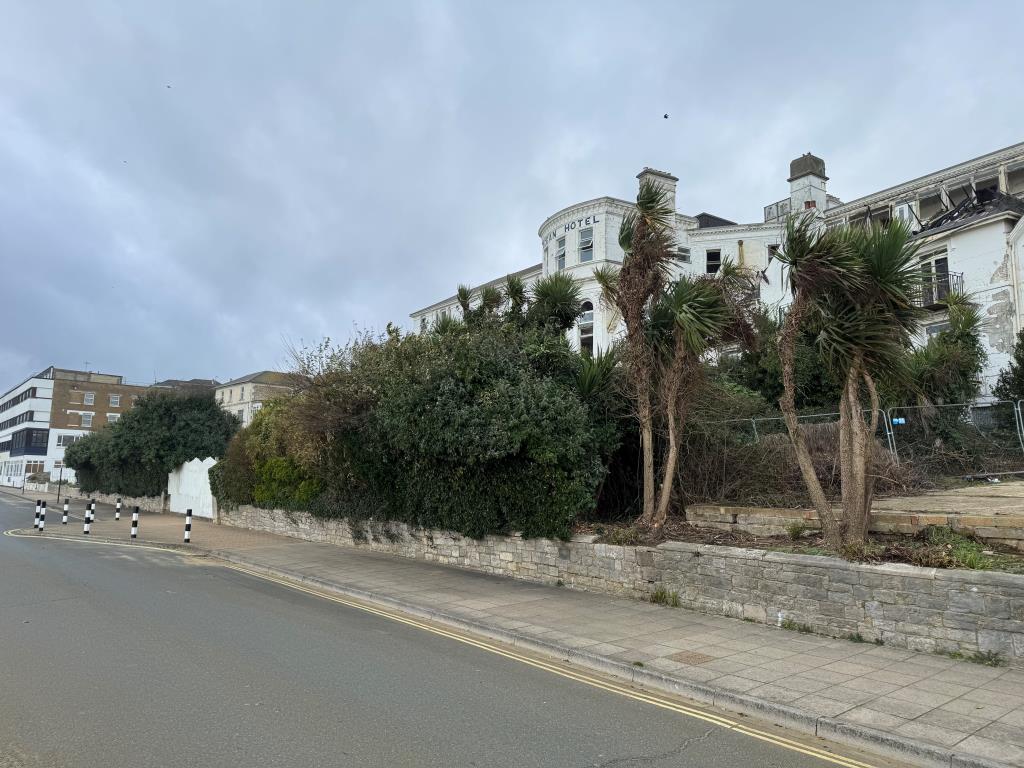 Lot: 22 - SEAFRONT LAND WITH POTENTIAL - A view from the seafront from the alternative elevation